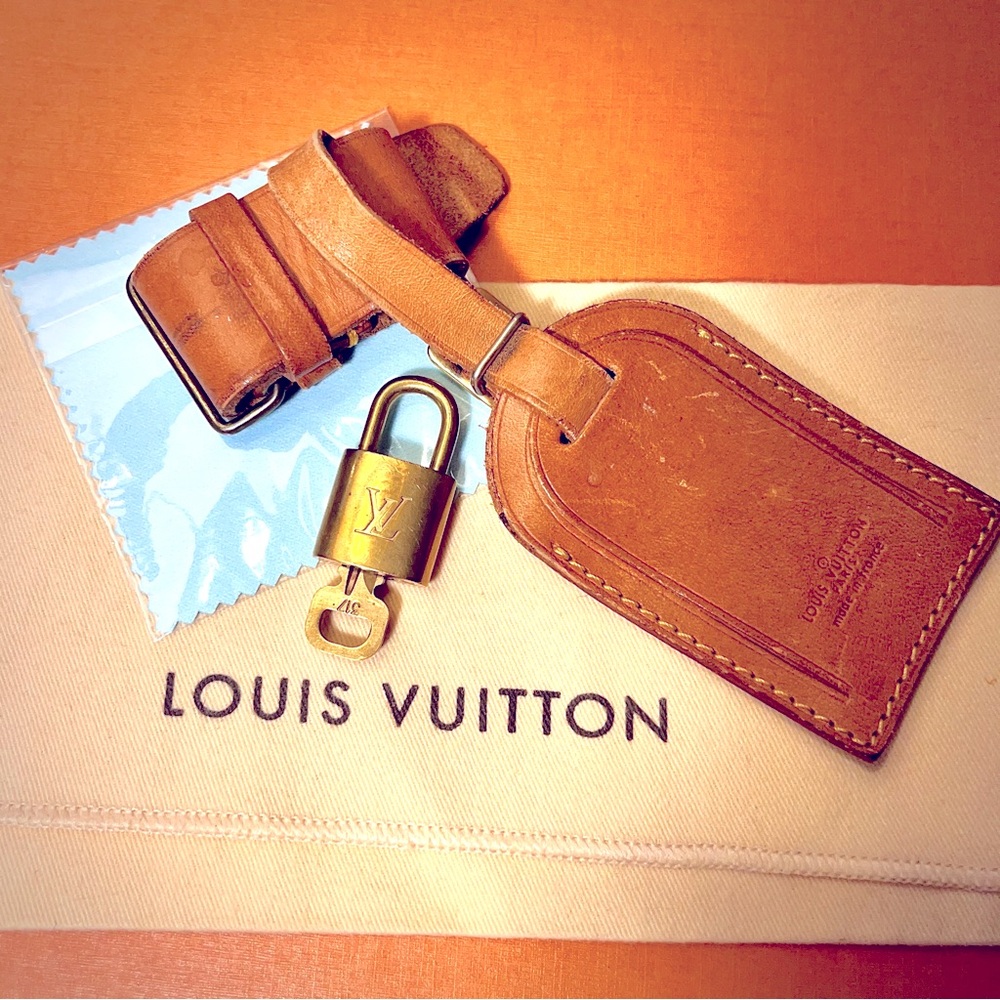 Authentic Louis Vuitton lock and key luggage tag and holder pre-loved unisex